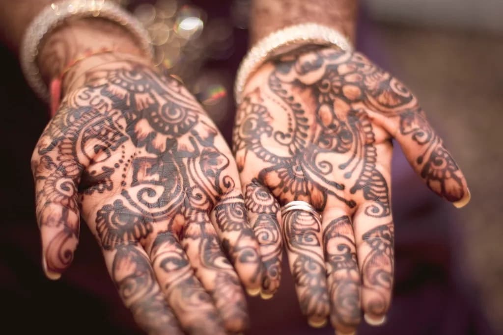 Open palms with intricate bridal mehendi